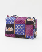 cosmetic travel bag in a purple & royal blue checkered print with orange hand-stitched kantha embroidery