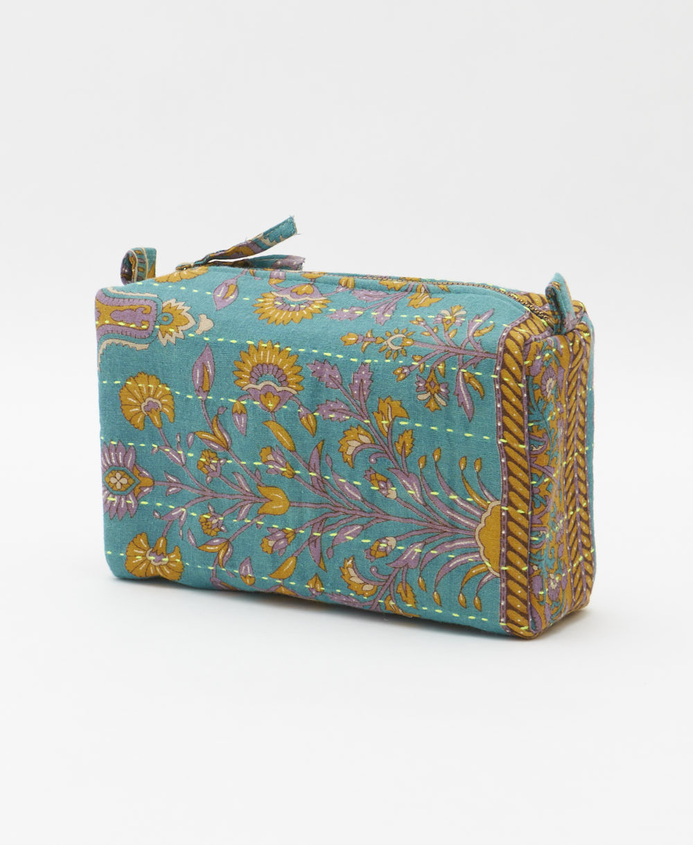 cosmetic travel bag in a purple, gold & teal floral print with neon hand-stitched kantha embroidery