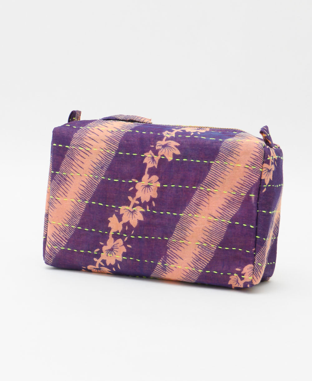 cosmetic travel bag in a purple & peach floral print with neon hand-stitched kantha embroidery