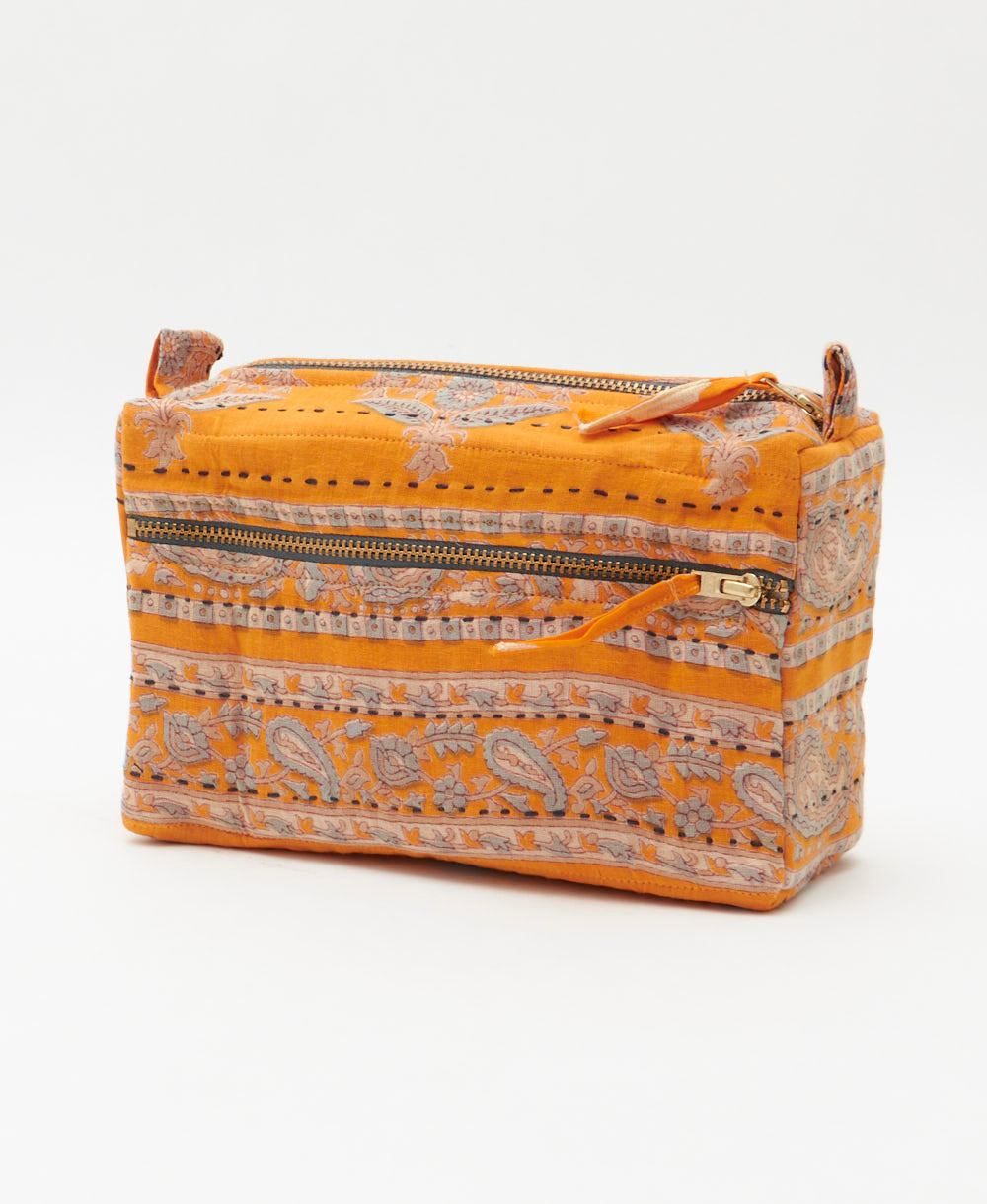 light orange medium toiletry bag with light grey paisley print handmade in India from vintage fabrics