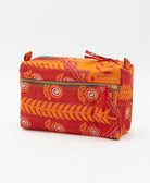 red medium toiletry bag with orange leaf print handmade in India from vintage cotton saris by women artisans