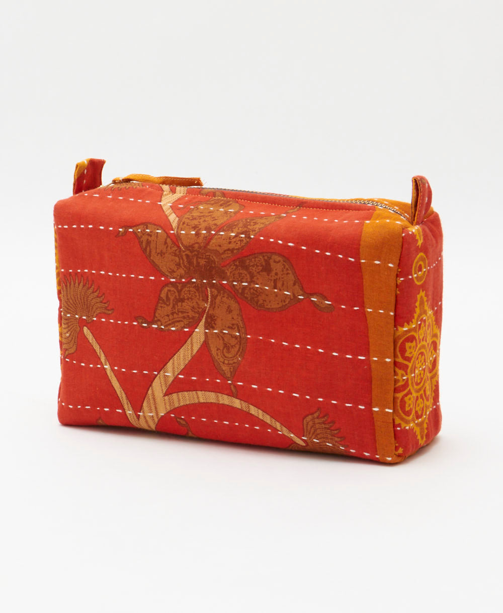 cosmetic travel bag in orange and golden yellow abstract print made in India