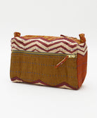 rust medium toiletry bag in olive green and maroon chevron print made in India by women artisans