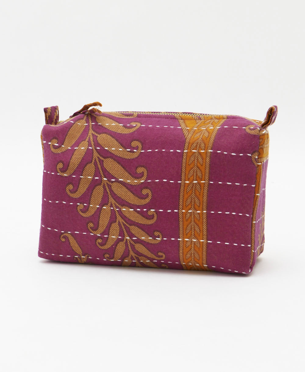 sustainable cosmetic travel bag in eggplant & orange botanical print handmade & embroidered in India