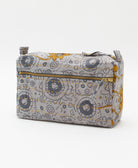 light grey medium toiletry bag in an abstract swirl print with yellow accents handmade in India