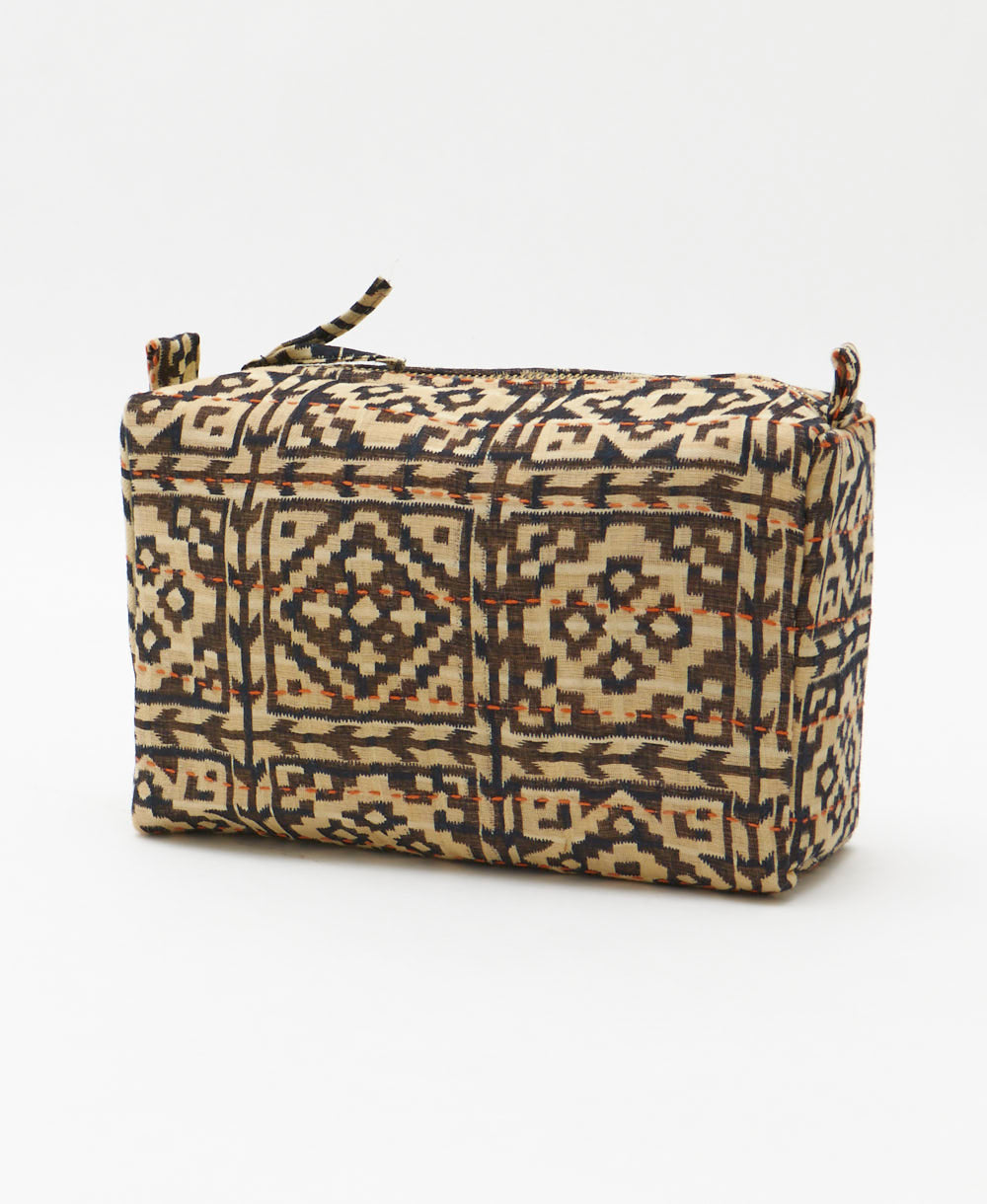 cosmetic travel bag in unique black and pale yellow southwestern print handmade in India by women artisans