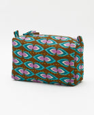 ethically made cosmetic travel bag in a brown, teal and purple teardrop print