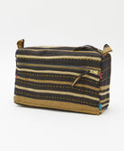 black medium toiletry bag in a tan stripe print made in India by women artisans