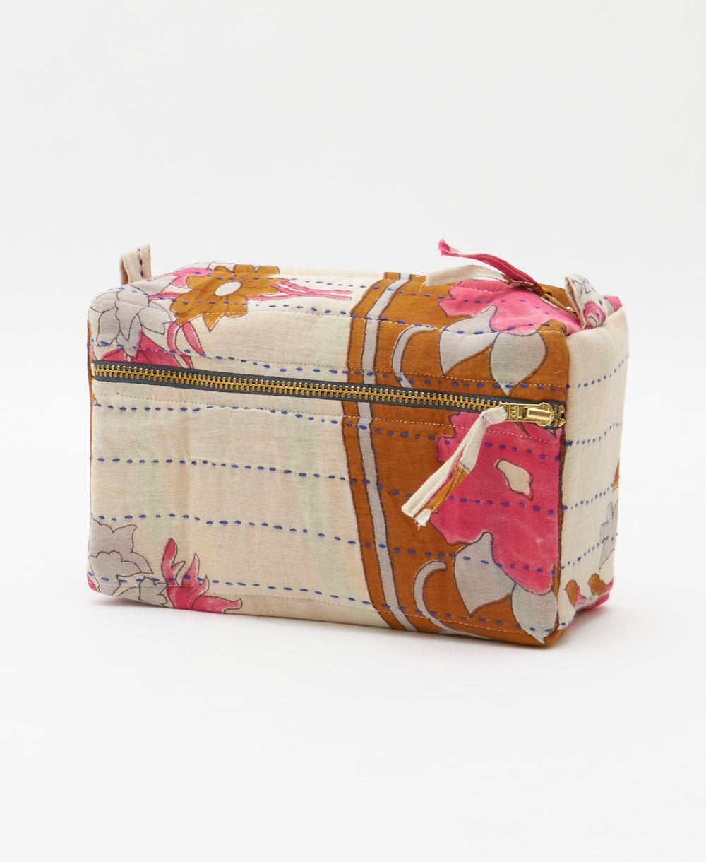 medium toiletry bag in a white, camel and hot pink floral print made from eco-friendly vintage fabrics