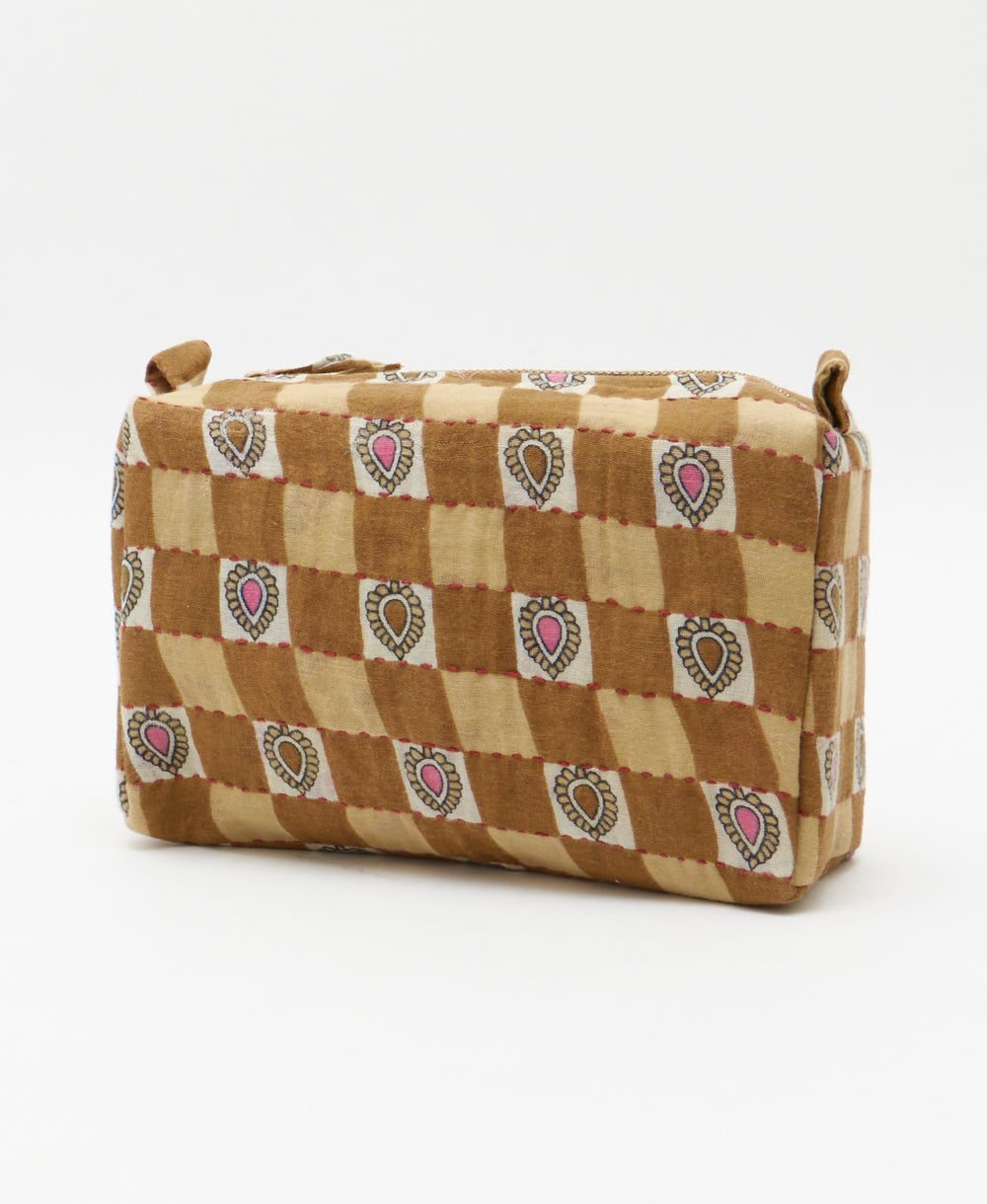 checkered cosmetic travel bag in light brown and pink hues