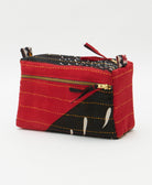 red & black medium toiletry bag with bold abstract angle pattern and orange embroidery