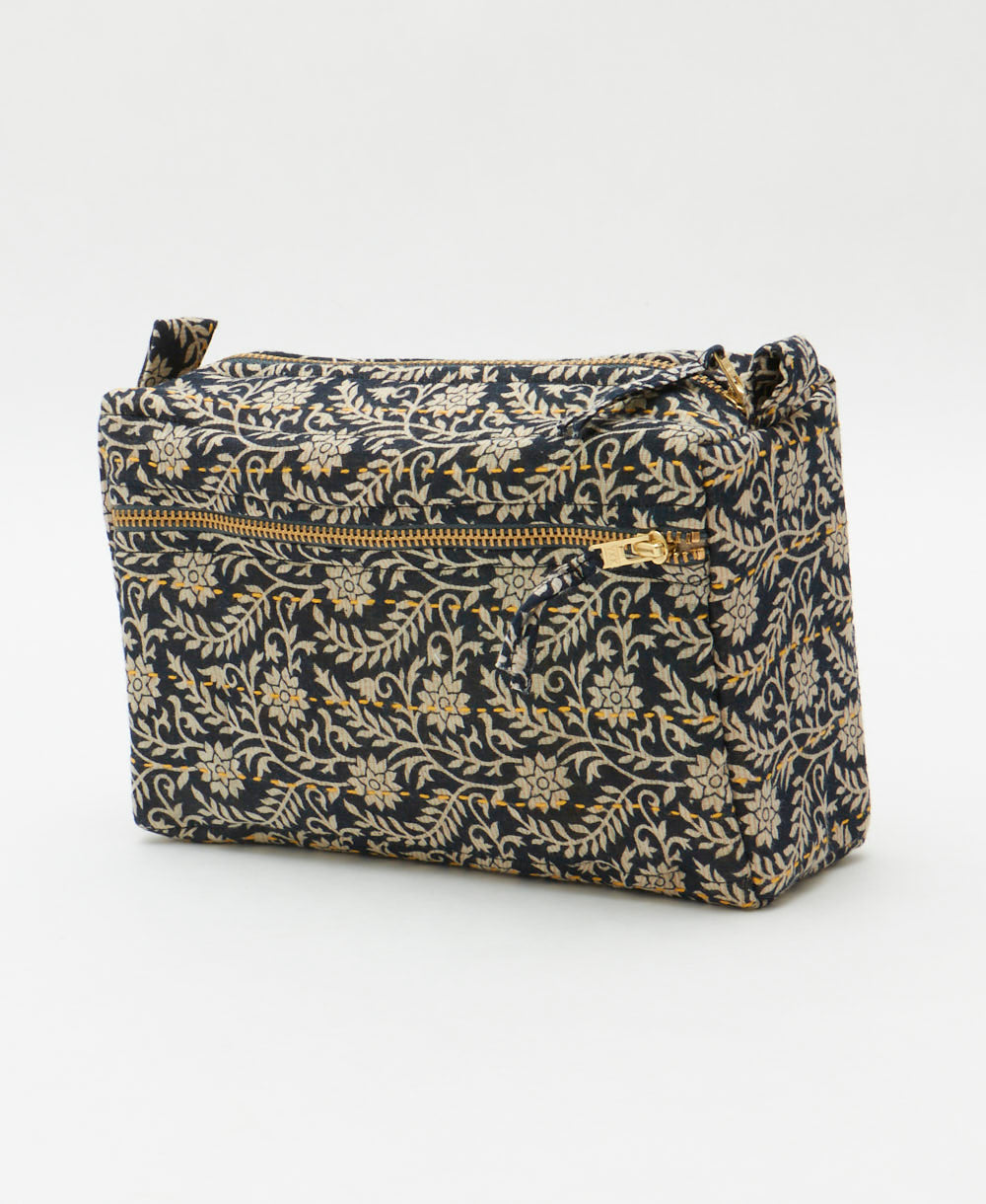 medium toiletry bag in a charcoal and light grey small floral print with sunshine yellow embroidery