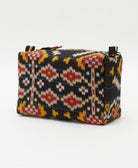 cosmetic travel bag in a black geometric southwestern pring with light blue embroidery