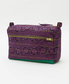 eggplant purple medium toiletry bag in a black and bright green floral stripe print