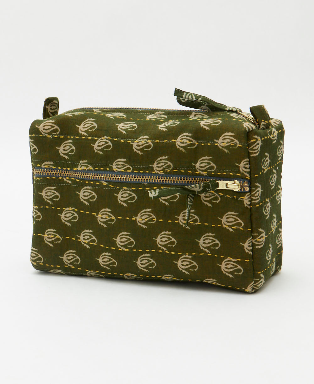 olive green medium toiletry bag with light grey floral symbols handmade from one-of-a-kind vintage fabrics