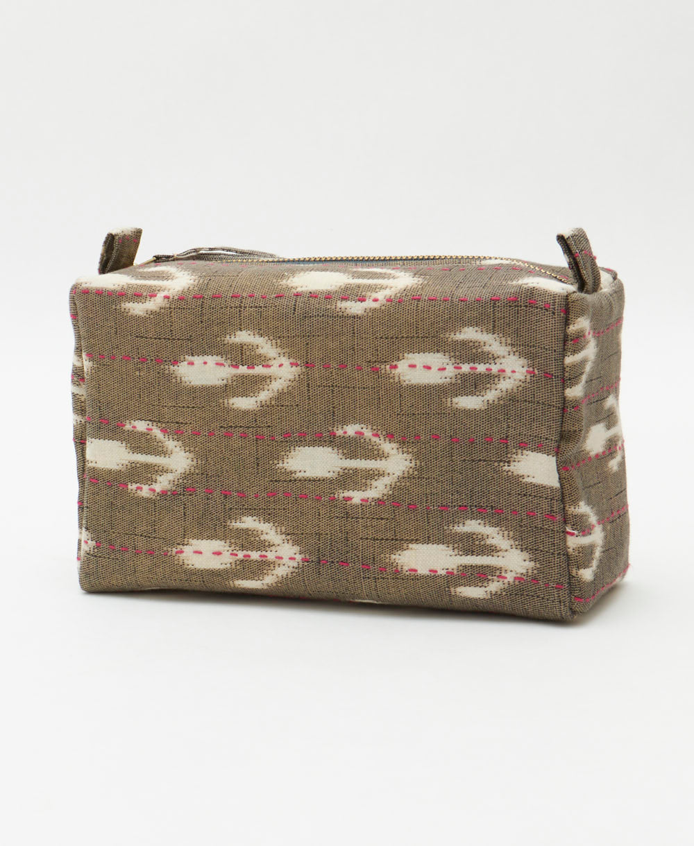 light brown cosmetic travel bag with unique white diamond print handmade in India