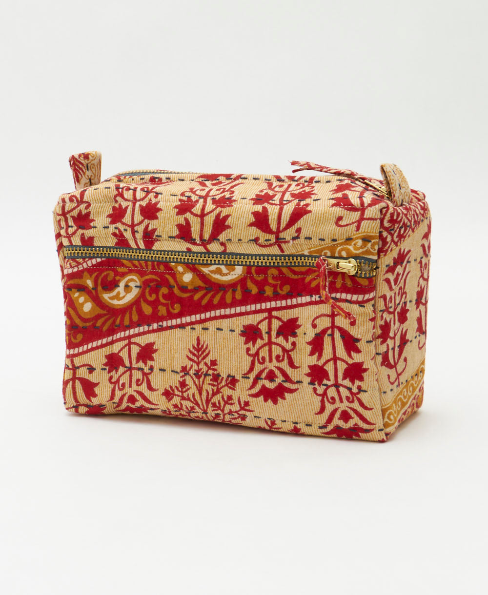 tan medium toiletry bag with cherry red floral accents handmade in India from unique cotton saris