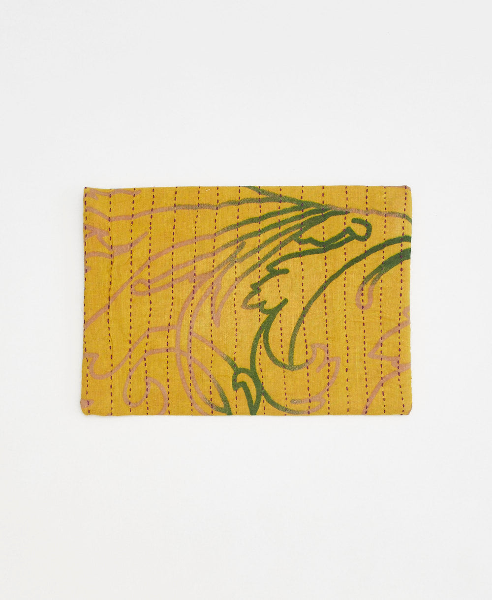 ethically made pouch clutch in mustard yellow with red embroidery