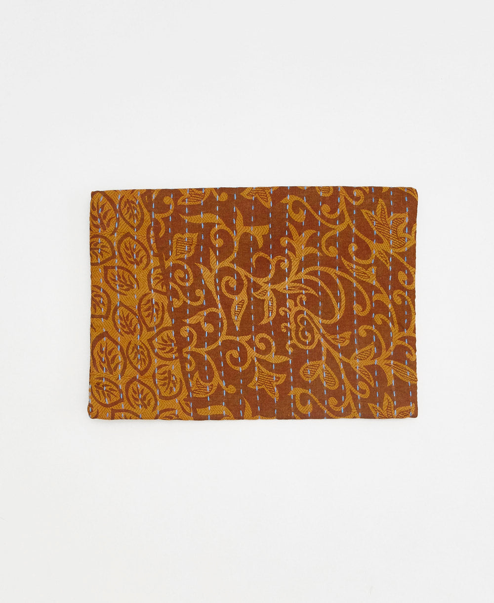 canvas-lined small pouch in camel leaf print with sky blue kantha stitching