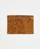 one-of-a-kind zippered pouch in a camel and tan leaf print made in India by women artisans