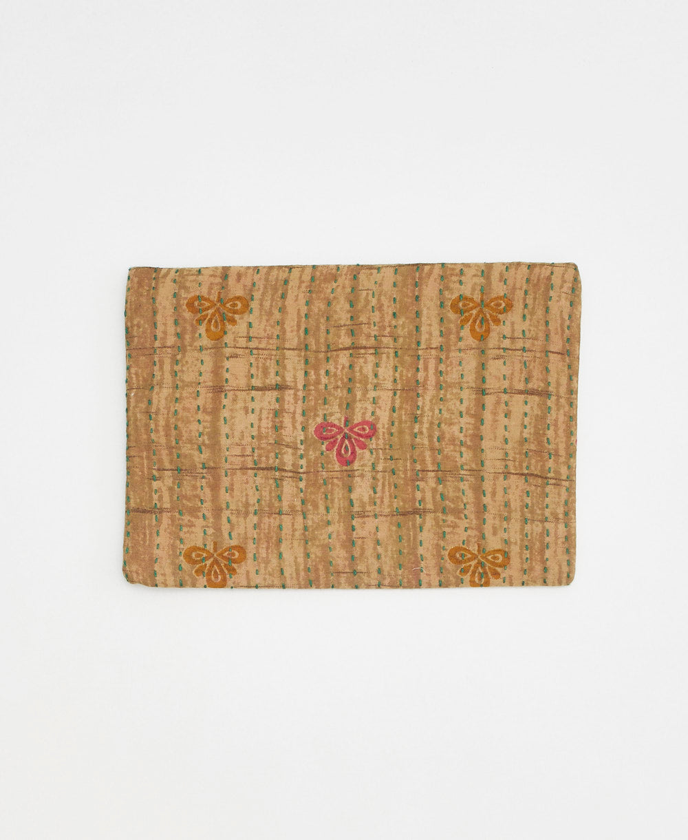 hand-embroidered zip pouch lined with canvas and made from tan floral vintage saris