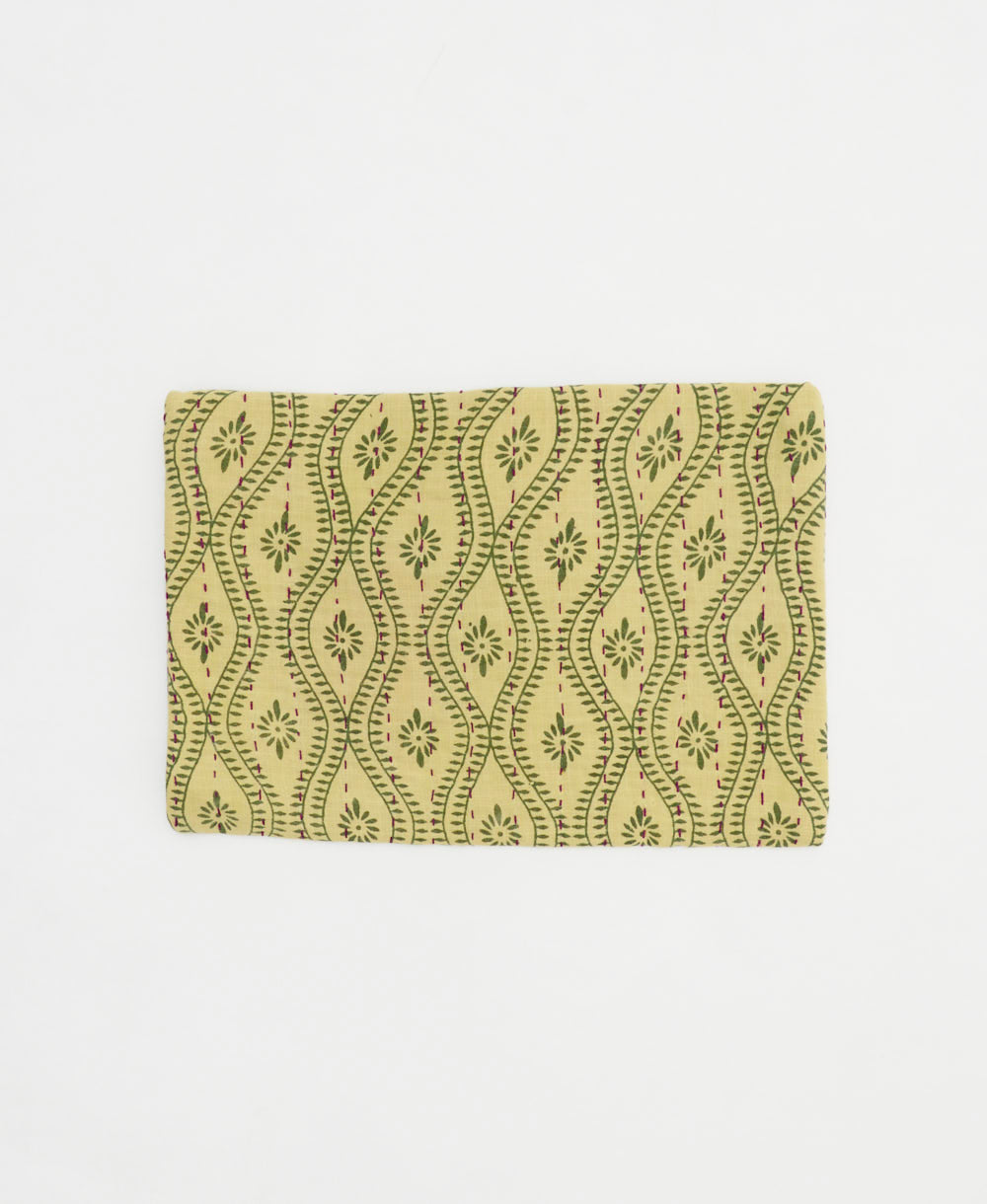 pale yellow small zipper pouch in olive green wavy print with maroon kantha stitching