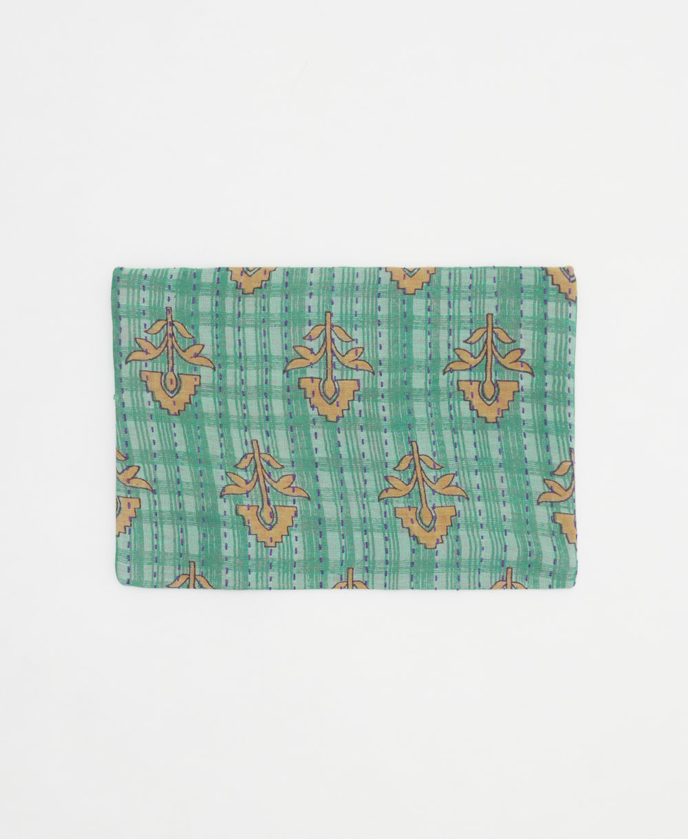 eco-friendly small zipper pouch in seafoam green with abstract tan florals made in India