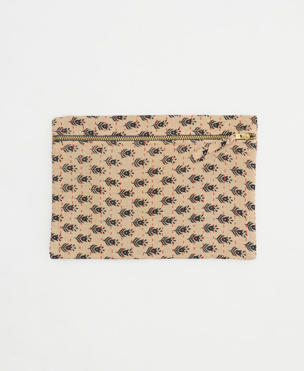 tan small pouch with tiny black floral print handmade in India from vintage cotton saris by all women artisans