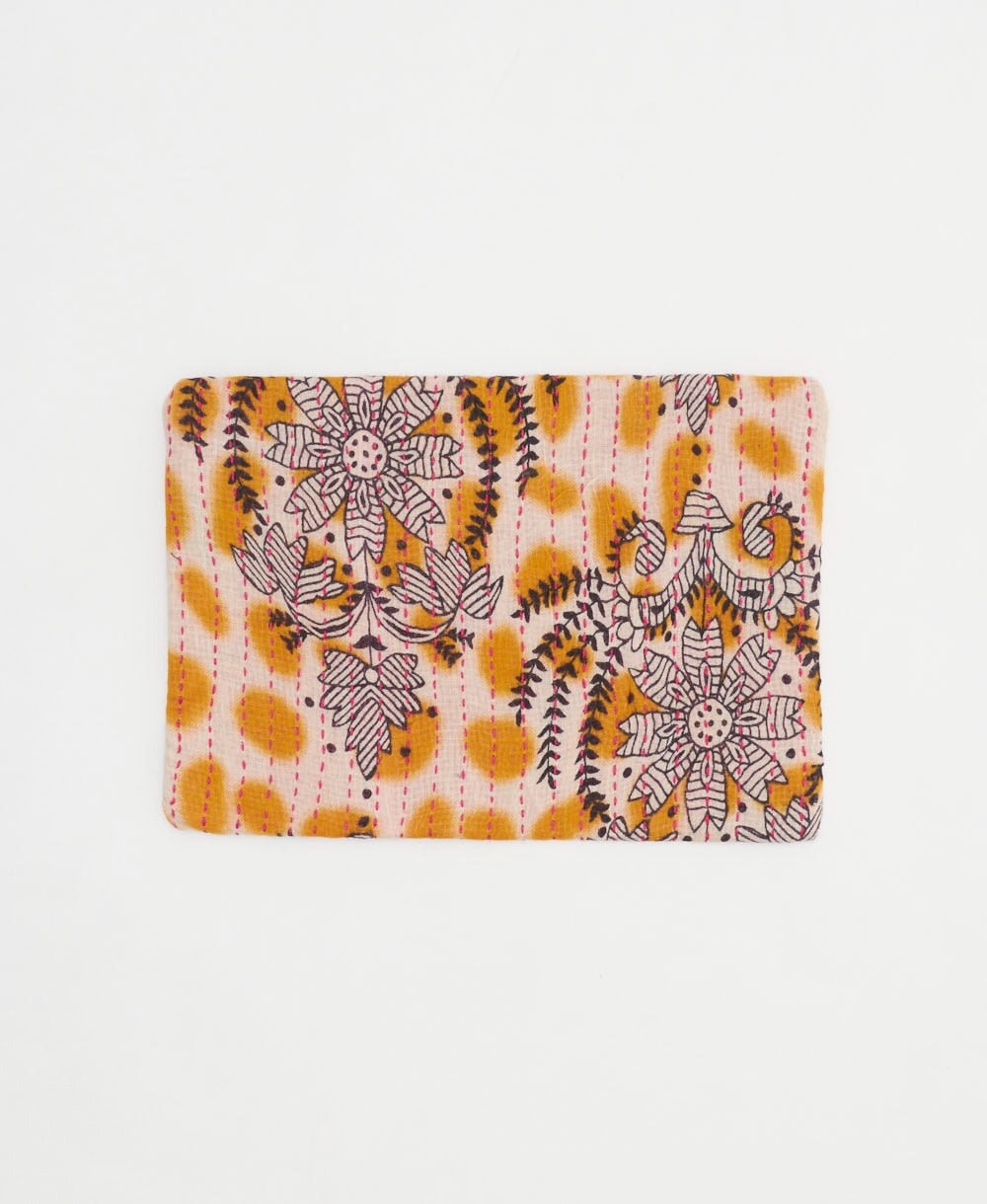 small zipper pouch in mustard yellow and brown floral with neon pink kantha stitching