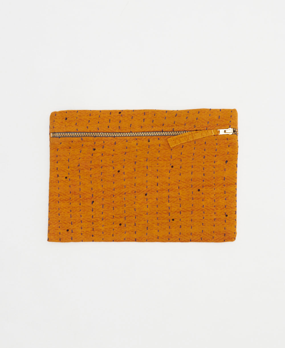 orange small pouch with tiny black polka dots made from vintage cotton saris in India