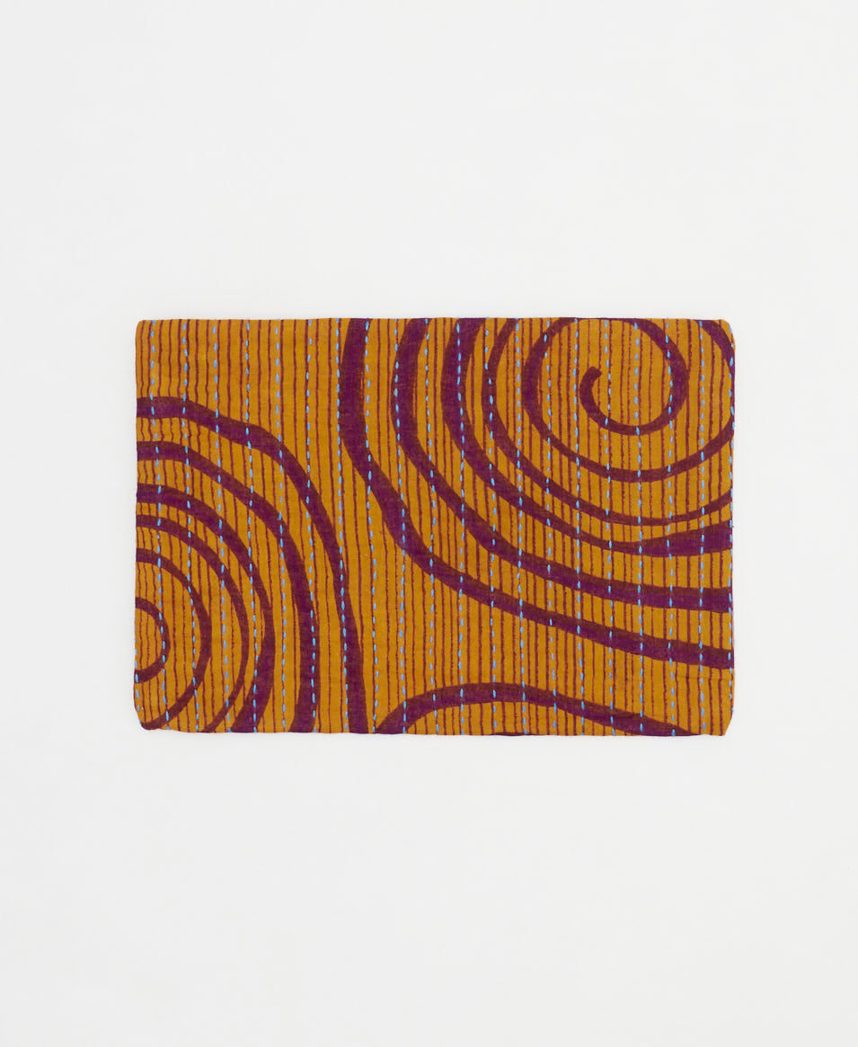 small zipper pouch in orange and eggplant swirl design made from vintage cotton saris in India