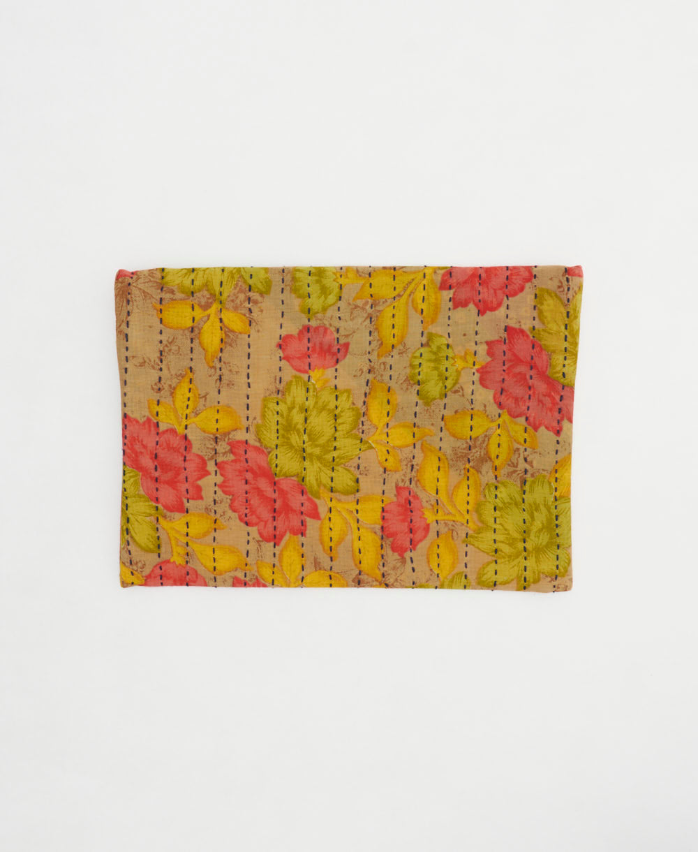 small zipper pouch in tan, coral, yellow and lime floral pattern