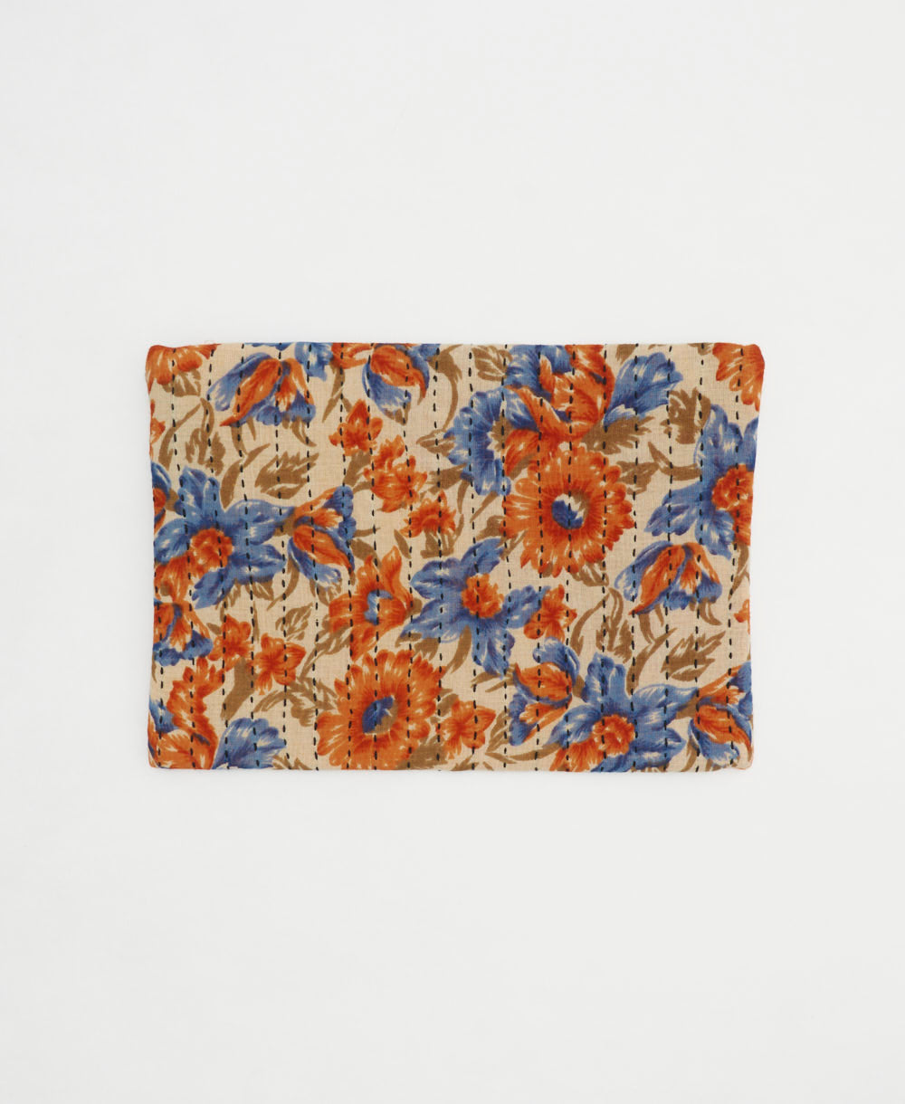 bold floral small zipper pouch in orange and blue handmade in India by women artisans