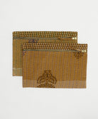 unique pouches in brown geometric print with different colored embroidery thread