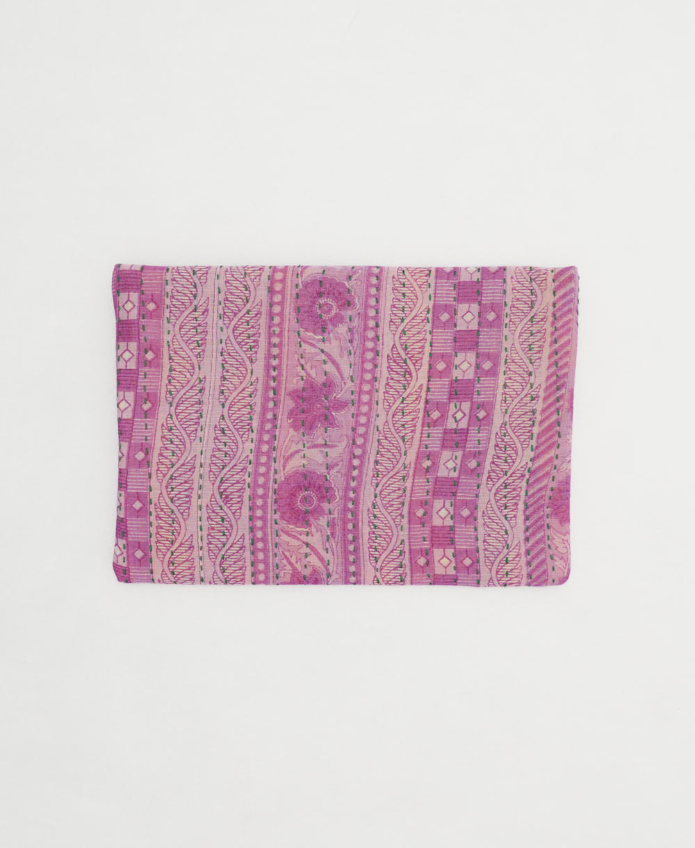 small zipper pouch with hand-stitched embroidery in unique bohemian vintage fabric