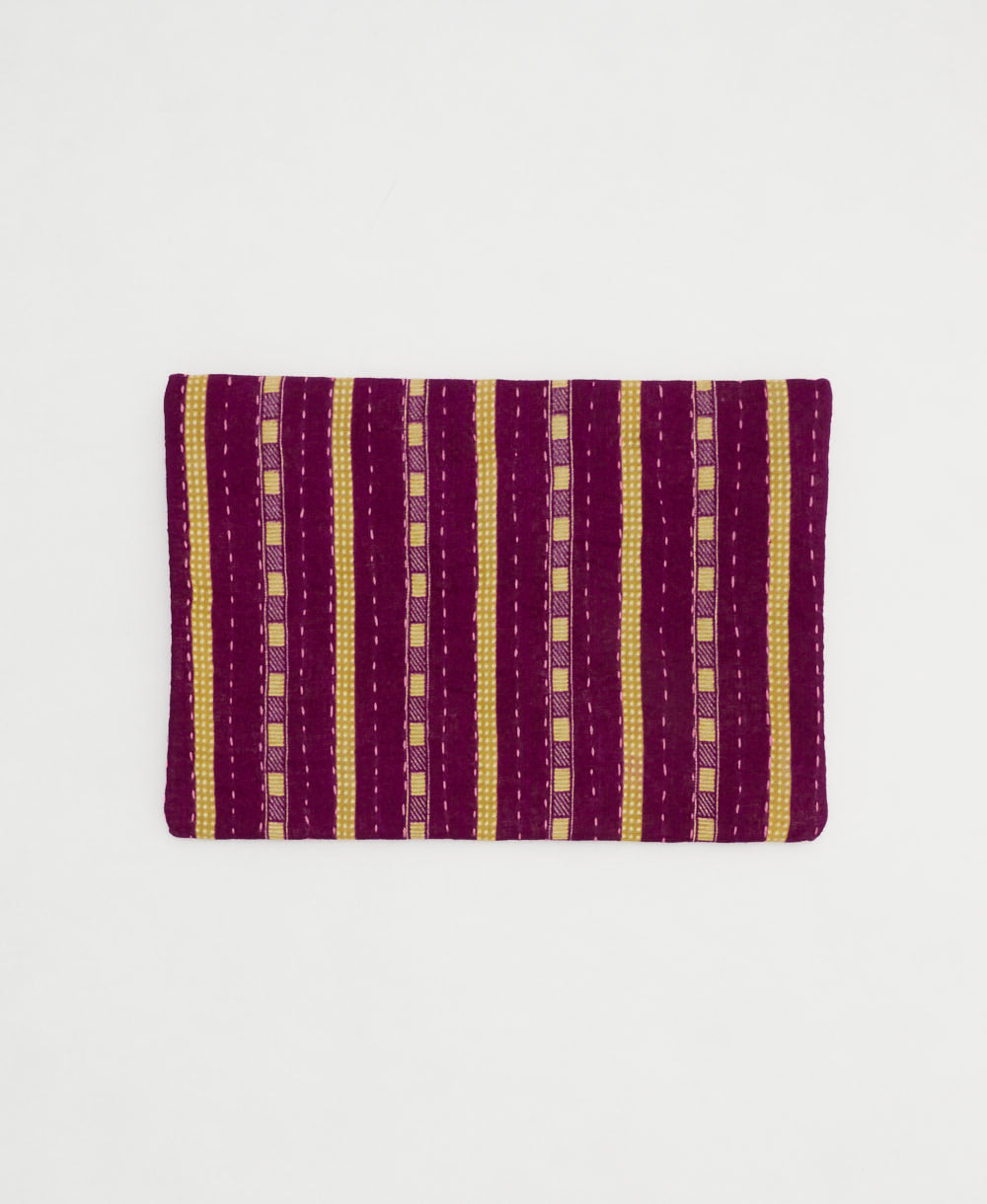 small zipper pouch with hand-stitched embroidery in unique bohemian vintage fabric