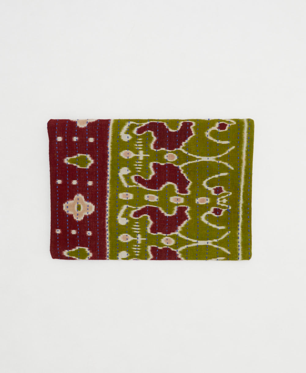 small zipper pouch with hand-stitched embroidery in unique bohemian vintage fabric