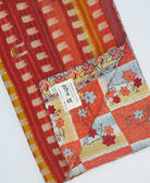 orange botanical Kantha quilt throw made of recycled vintage saris