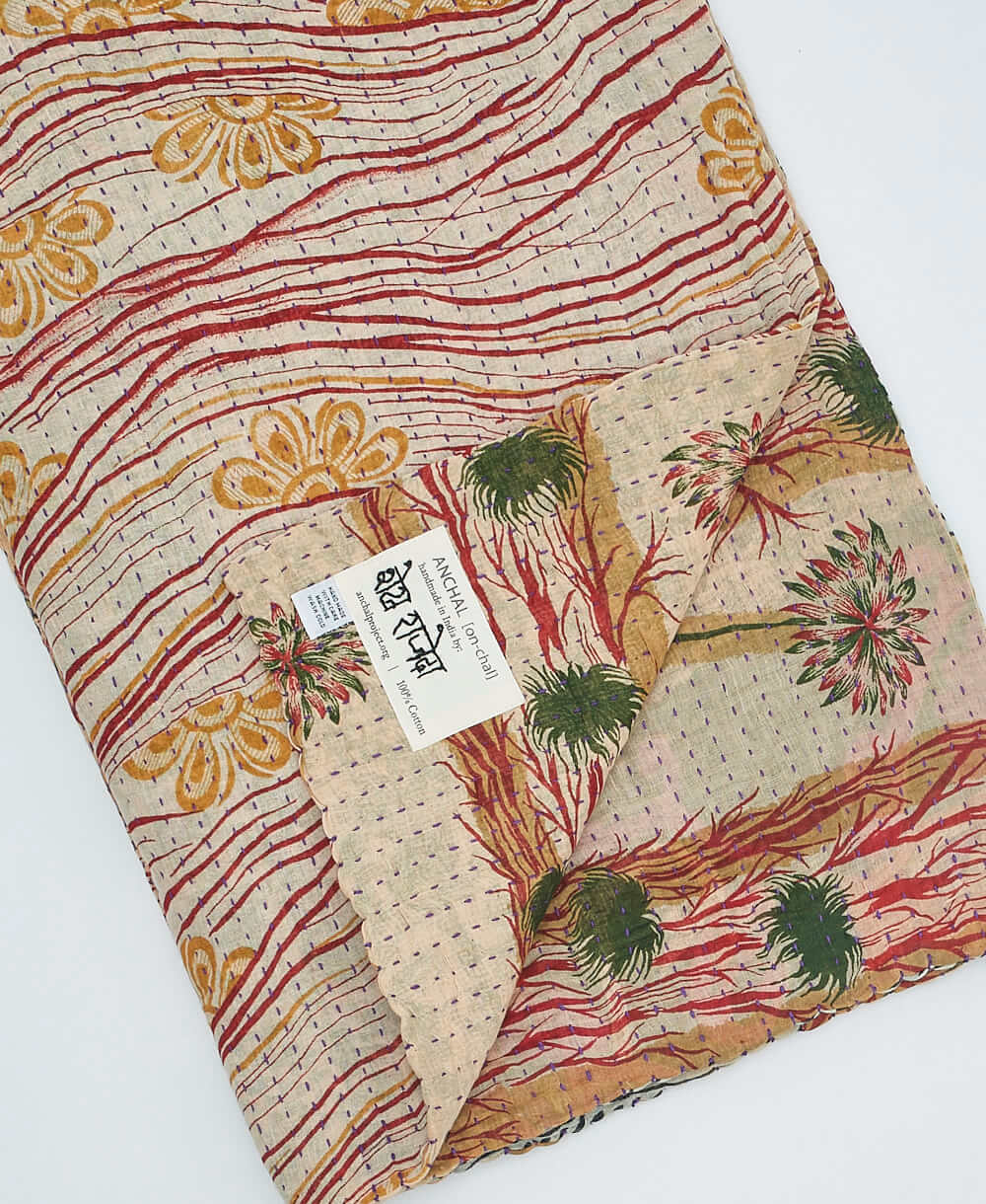 tan and red Floral Kantha quilt throw made of recycled vintage saris