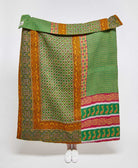 Artisan made orange and green geometric kantha quilt throw