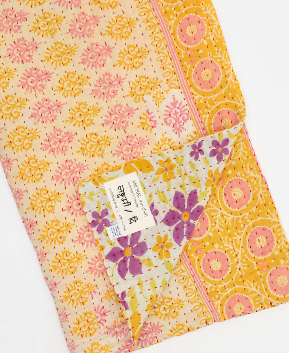 sunny yellow Kantha quilt throw made of recycled vintage saris