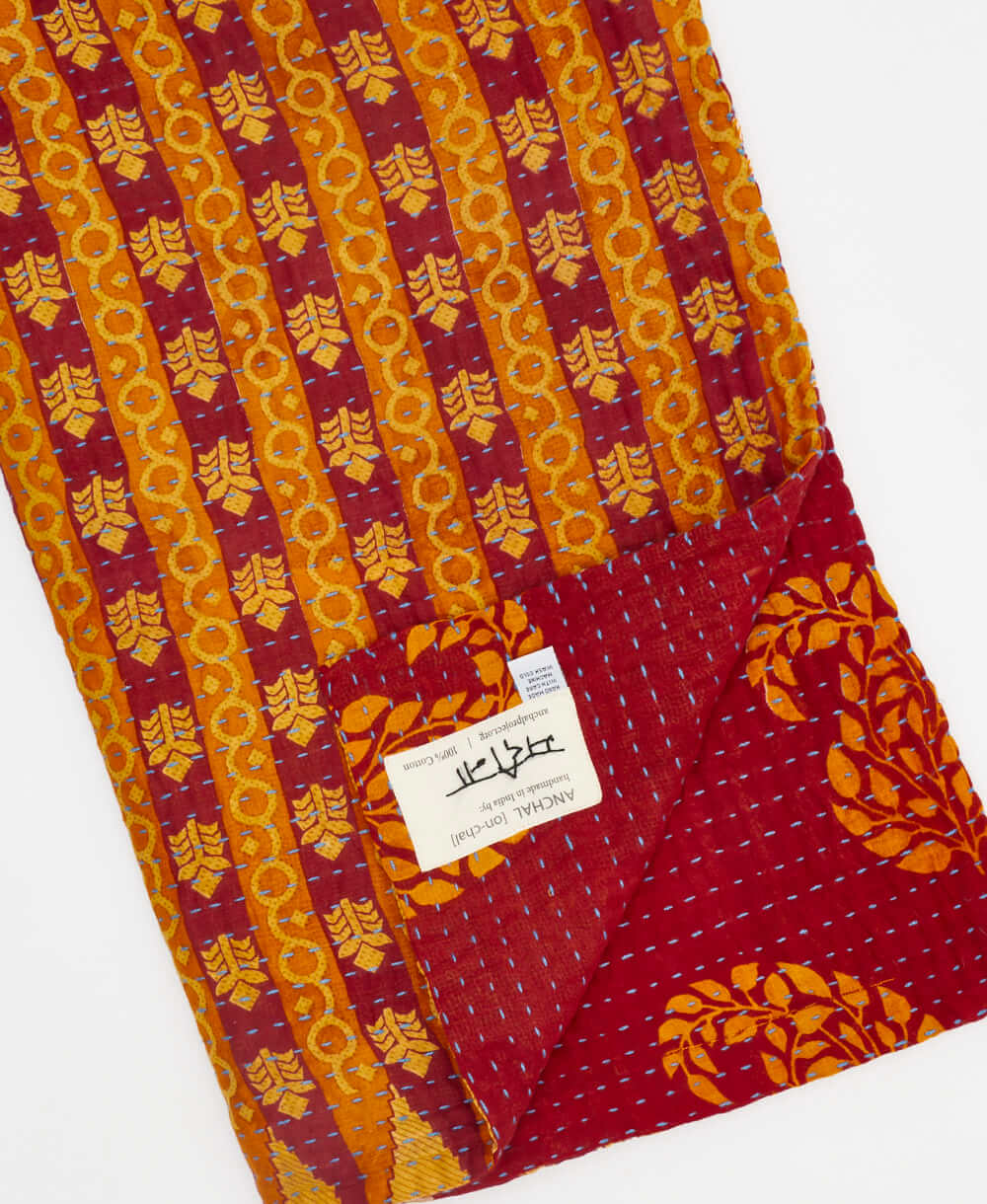 mustard yellow paisley Kantha quilt throw made of recycled vintage saris