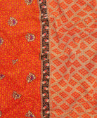 orange diamond Kantha quilt throw made of recycled vintage saris in India by all women artisans