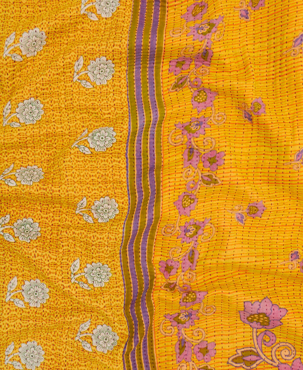 Kantha quilt throw featuring marigold yellow floral print & black traditional kantha hand stitching