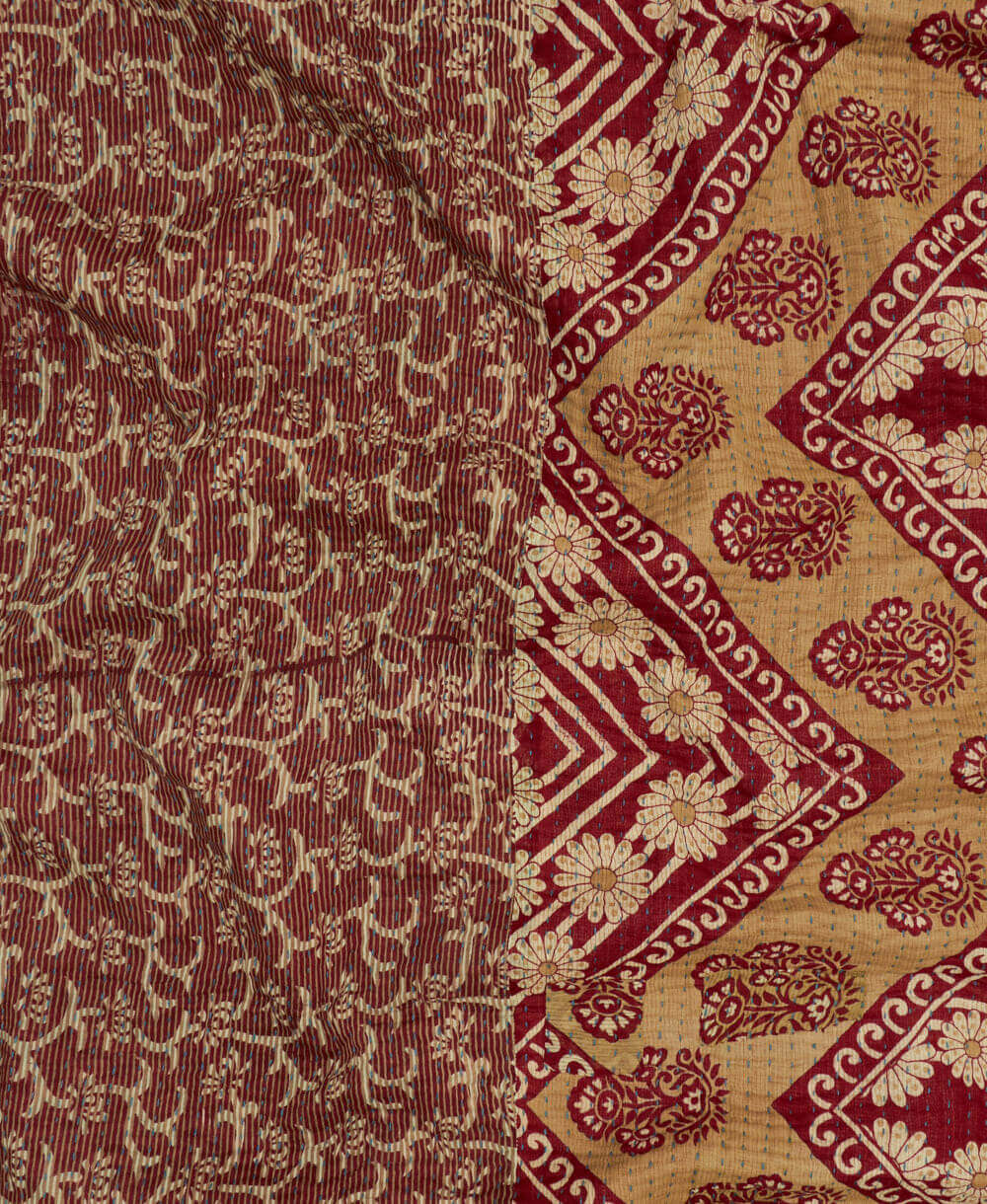 Kantha quilt throw featuring brick red daisy print & blue traditional kantha hand stitching