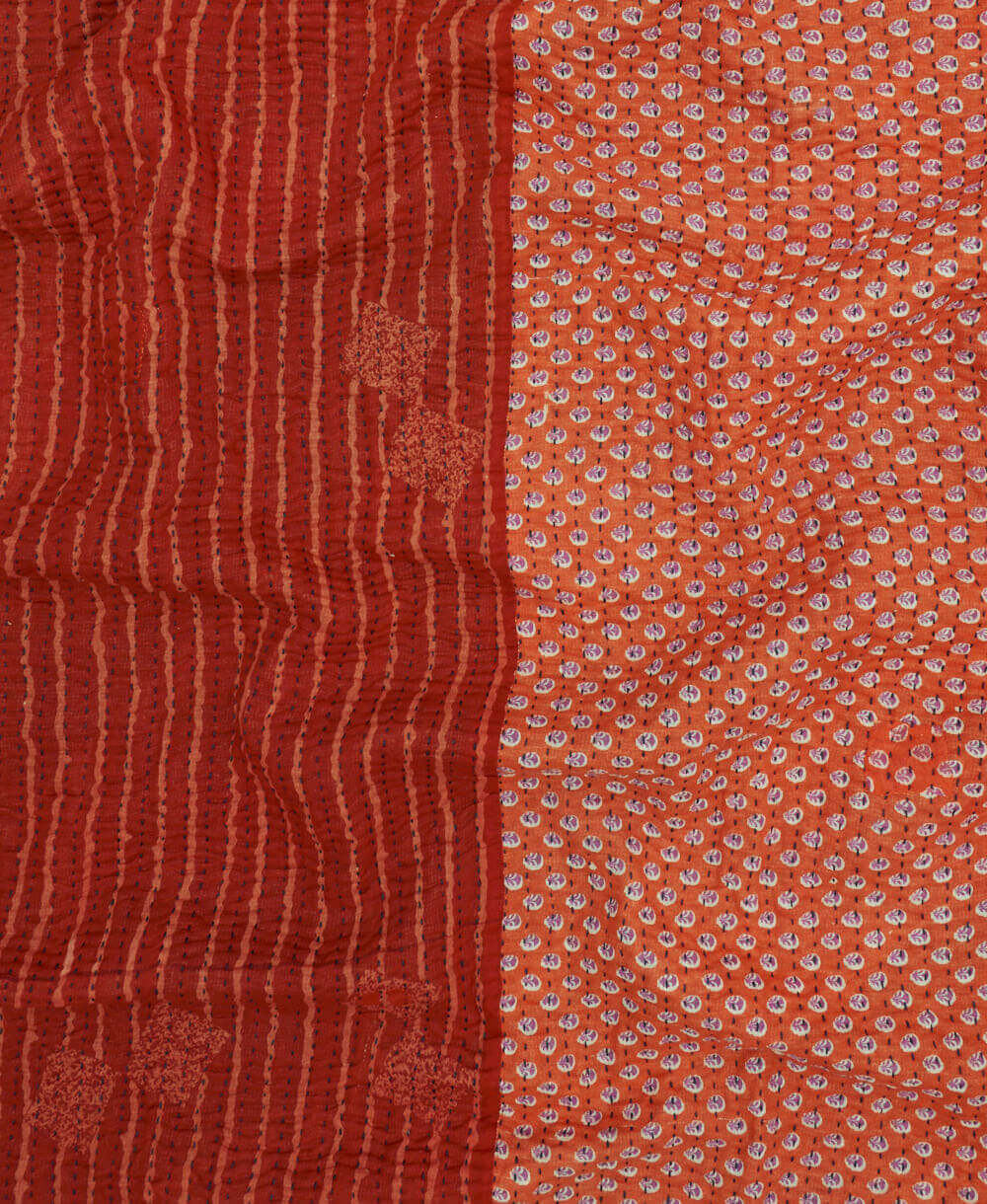 Kantha quilt throw featuring red & coral stripe print & black traditional kantha hand stitching