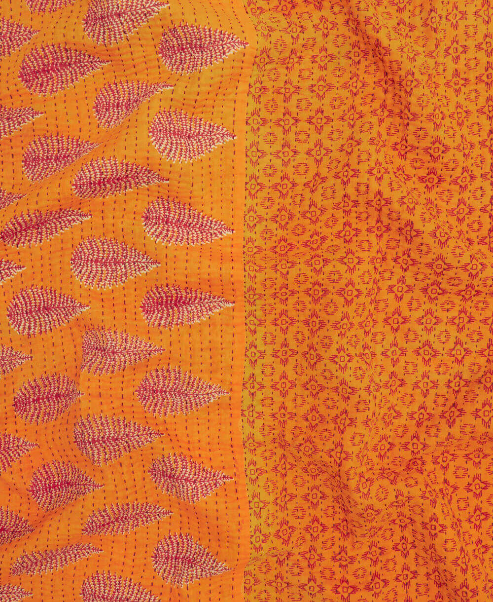 orange & red leaf Kantha quilt throw made of recycled vintage saris in India by all women artisans