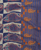 Kantha quilt throw featuring white traditional kantha hand stitching in oversized purple paisley print