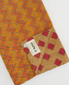 tan Kantha quilt throw made of recycled vintage saris in red diamond & orange stripe print