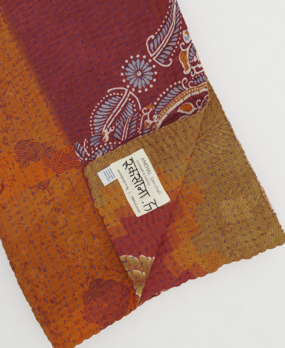 orange & red fern printed Kantha quilt throw made of recycled vintage saris